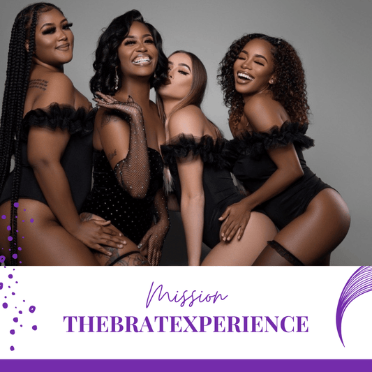 4 women in black dresses posing